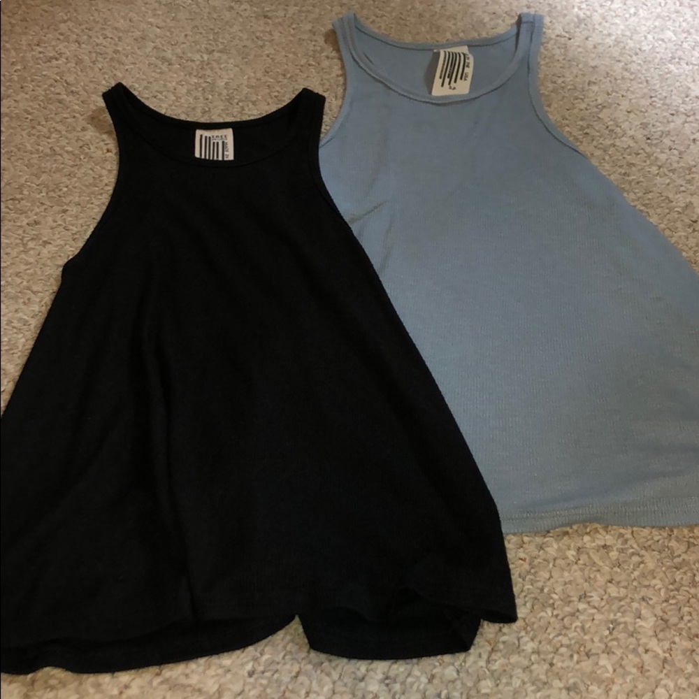 free people flowy tanks
